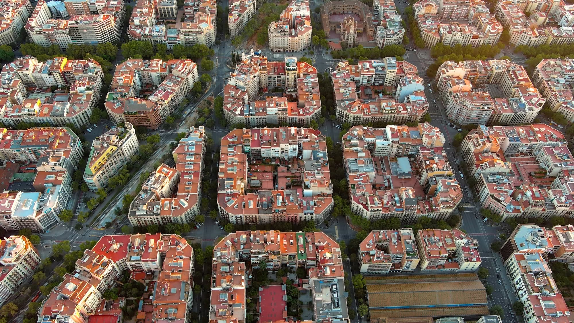 Aerial view of typical buildings of Barcelona cityscape. Eixample residential famous urban grid. Catalonia, Spain